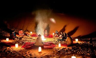 Bonfire under the stars Agafay Desert night pass Marrakech Morocco